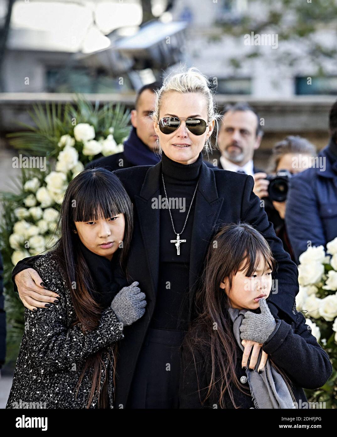 Laeticia Hallyday with her daughters Joy and Jade during the funeral  ceremony for french singer Johnny Hallyday at the Eglise de la Madeleine  (La Madeleine Church) in Paris, France on December 9,