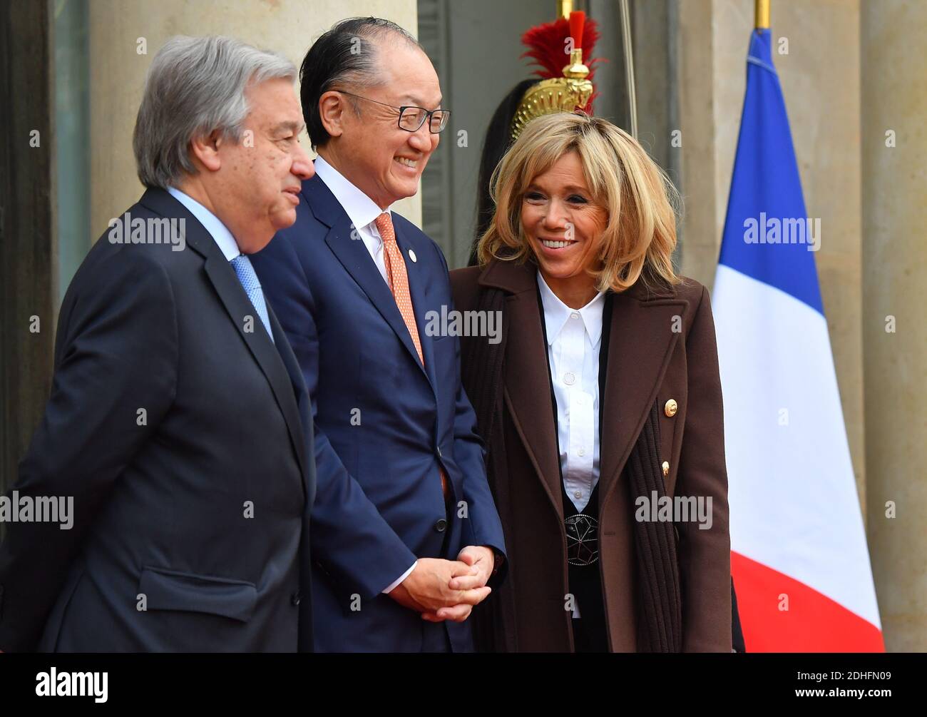 President Emmanuel Macron S Wife Brigitte Macron Welcomes United Nations Un Secretary General Antonio Guterres World Bank President Jim Yong Kim At The Elysee Palace In Paris France On December 12 2017 As