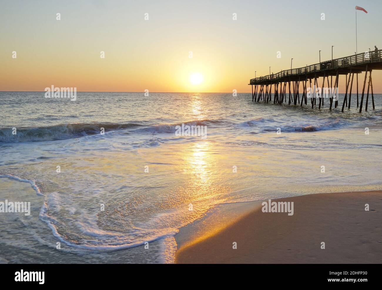 Avalon Pier and sandy beach at the Outer Banks of North Carolina at