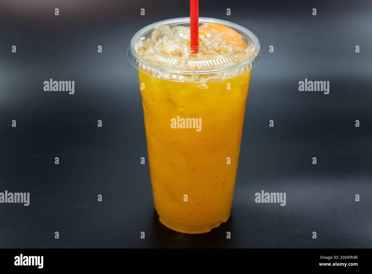 Orange Mexican Mango and Pinneapple fruit drink beverage will quench that thrist with sweet flavors. Stock Photo