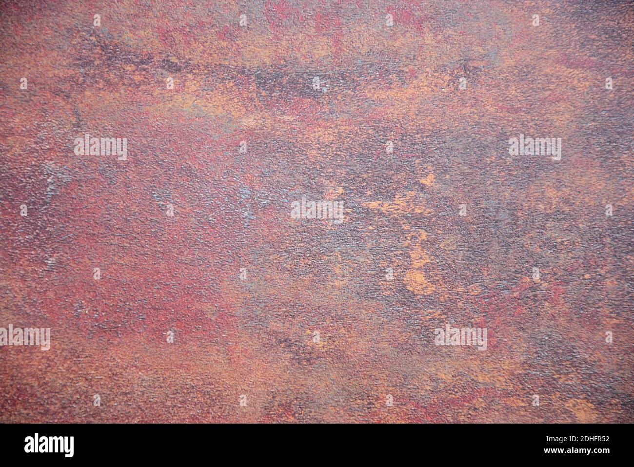 Old metal surface covered with brown rust. Close-up. Stock Photo