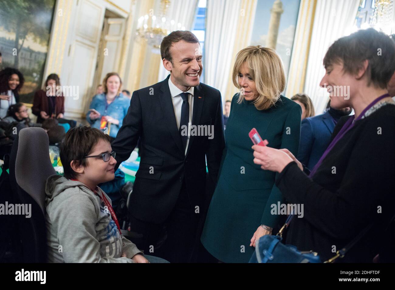 French President Emmanuel Macron and his wife Brigitte attend the French President Emmanuel Macron and his wife Brigitte attend the
