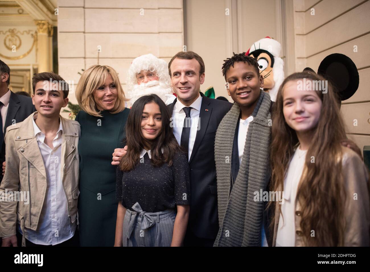 French President Emmanuel Macron and his wife Brigitte with Kids United ( Esteban, Gloria , Gabriel, Nilusi, Erza) attend the Elysee Christmas for  children, on December 13, 2017, at the Elysee Presidential palace