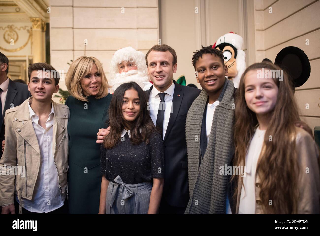 French President Emmanuel Macron and his wife Brigitte with Kids United