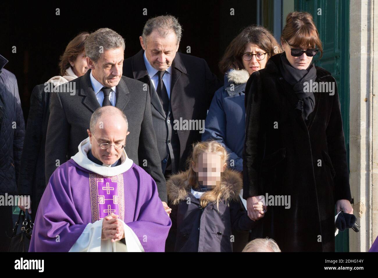 Nicolas Sarkozy, his wife Carla Bruni-Sarkozy and their daughter during the funeral of Andree Sarkozy aka Dadue, mother of Former French President Nicolas Sarkozy, at Saint-Jean-Baptiste church in Neuilly-Sur-Seine, France on December 18, 2017. Photo by ABACAPRESS.COM Stock Photo