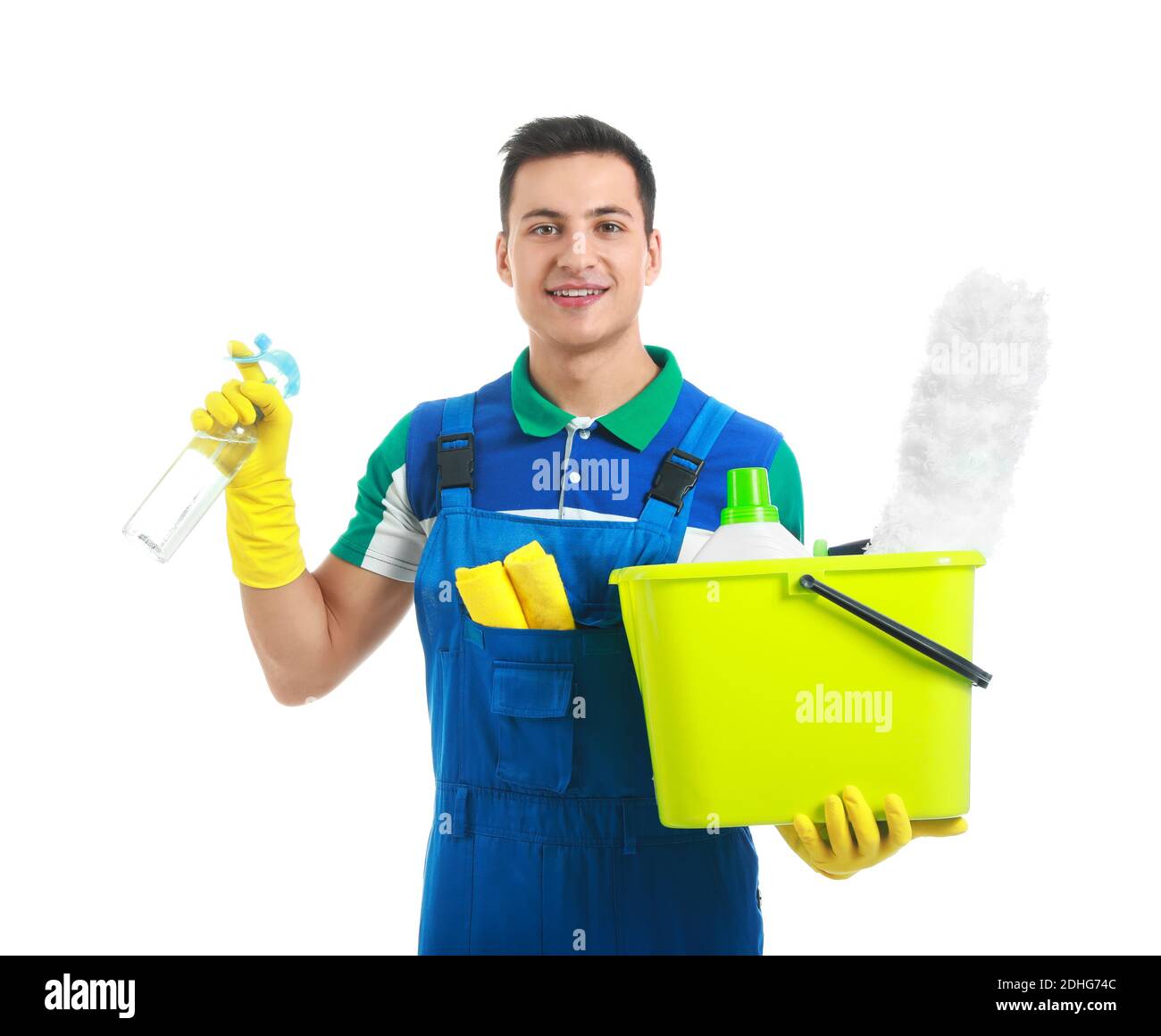 Generic Janitor Young male janitor with cleaning supplies on white background Stock ...