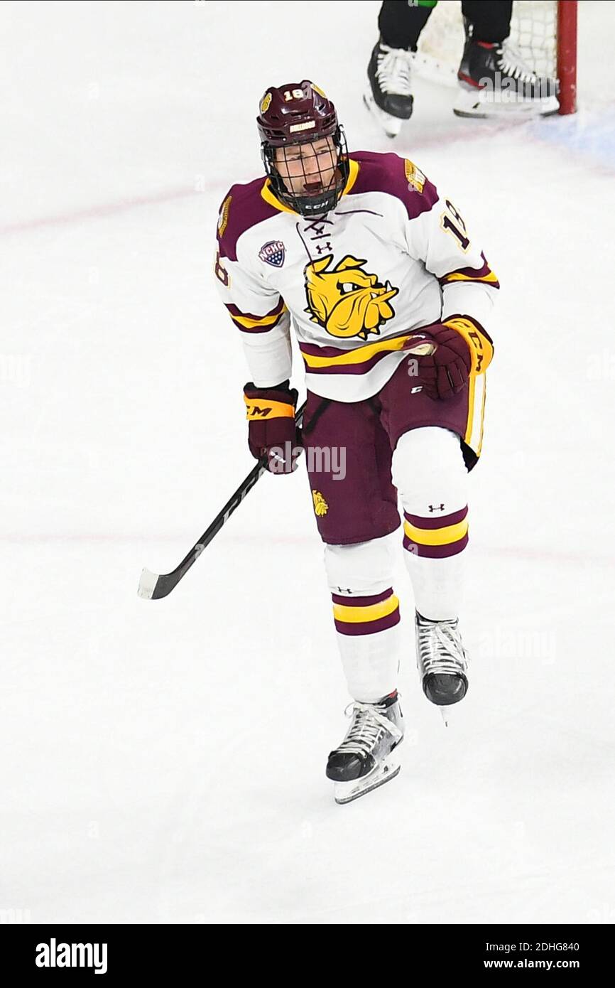December 10, 2020 Minnesota-Duluth Bulldogs forward Jesse Jacques (18)  celebrates after scoring a goal during a NCAA D1 men's hockey game between  the University of North Dakota Fighting Hawks and the University