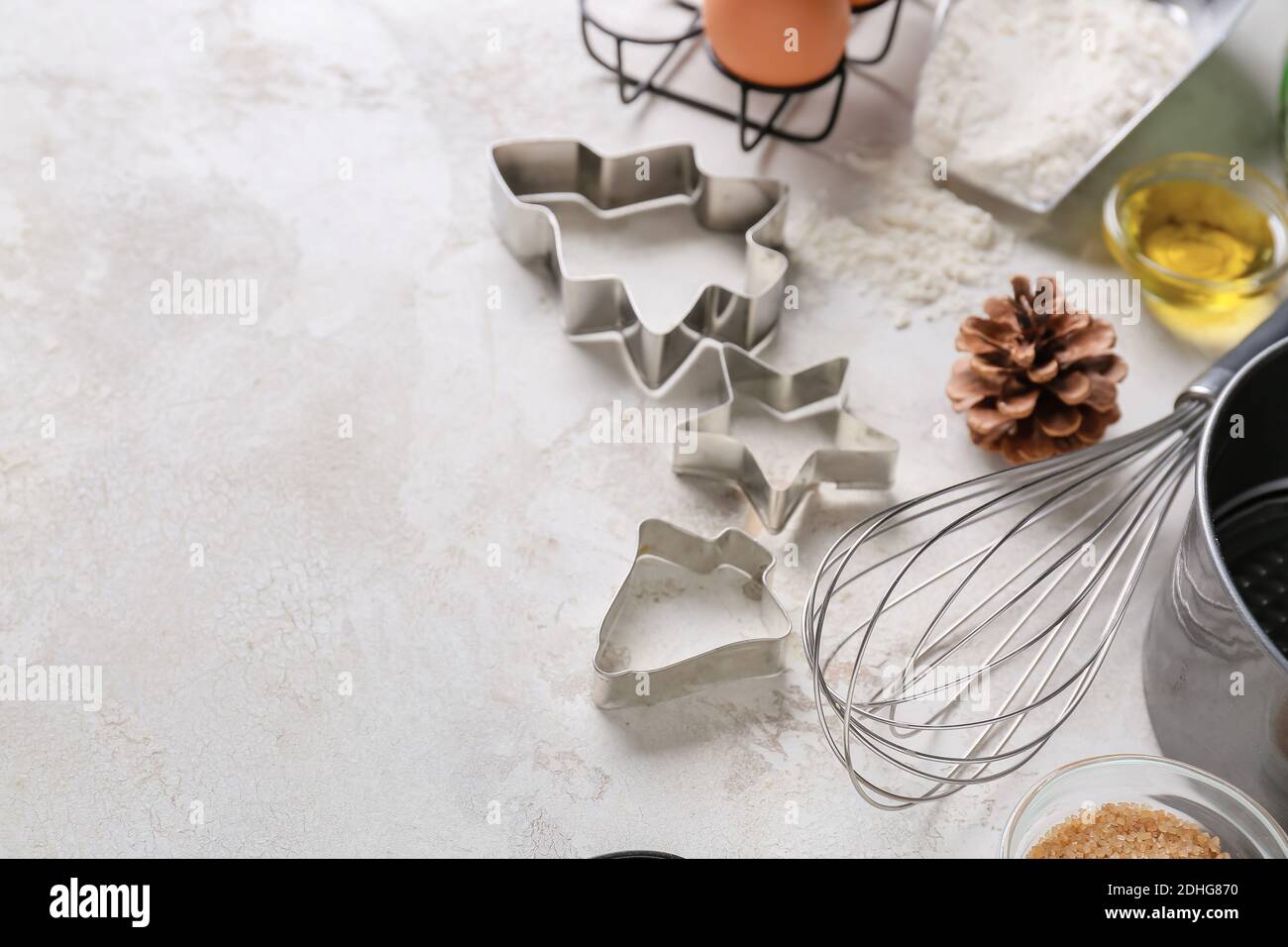 Baking utensils for Christmas cookies on light background Stock Photo