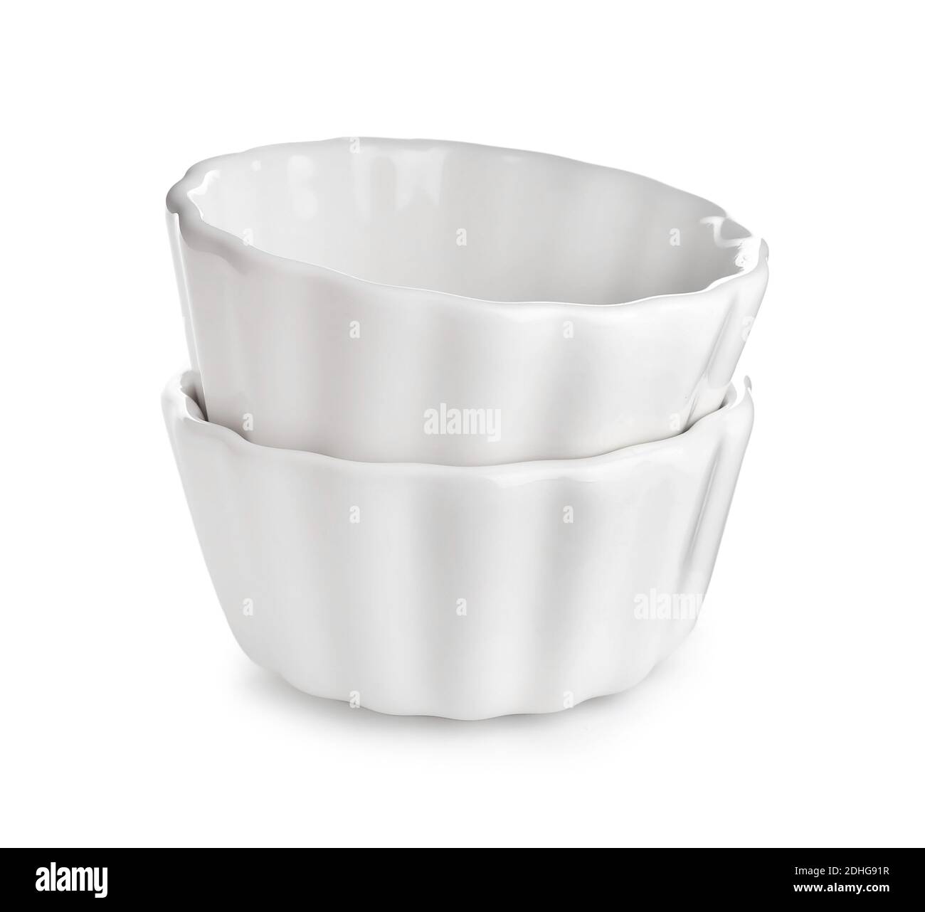 Ceramic ramekins on white background Stock Photo