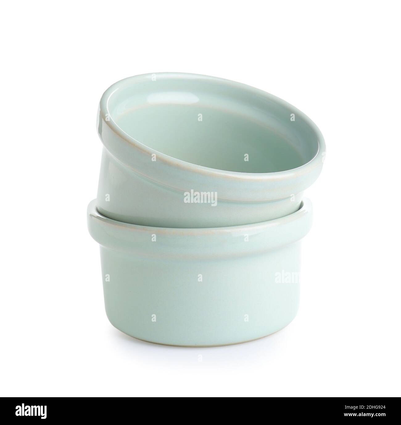 Ceramic ramekins on white background Stock Photo