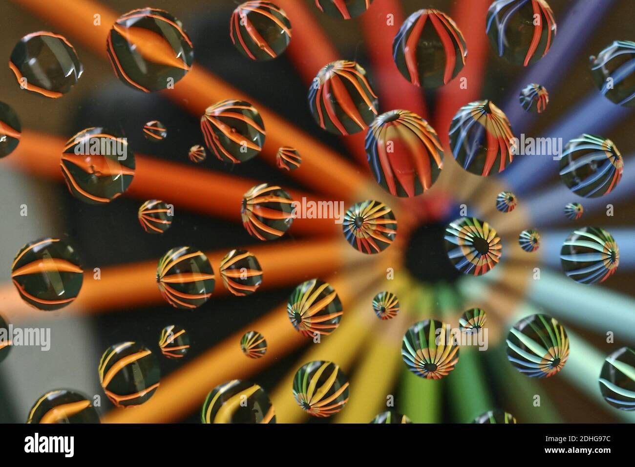 A macro shot of water droplets on colorful background Stock Photo - Alamy
