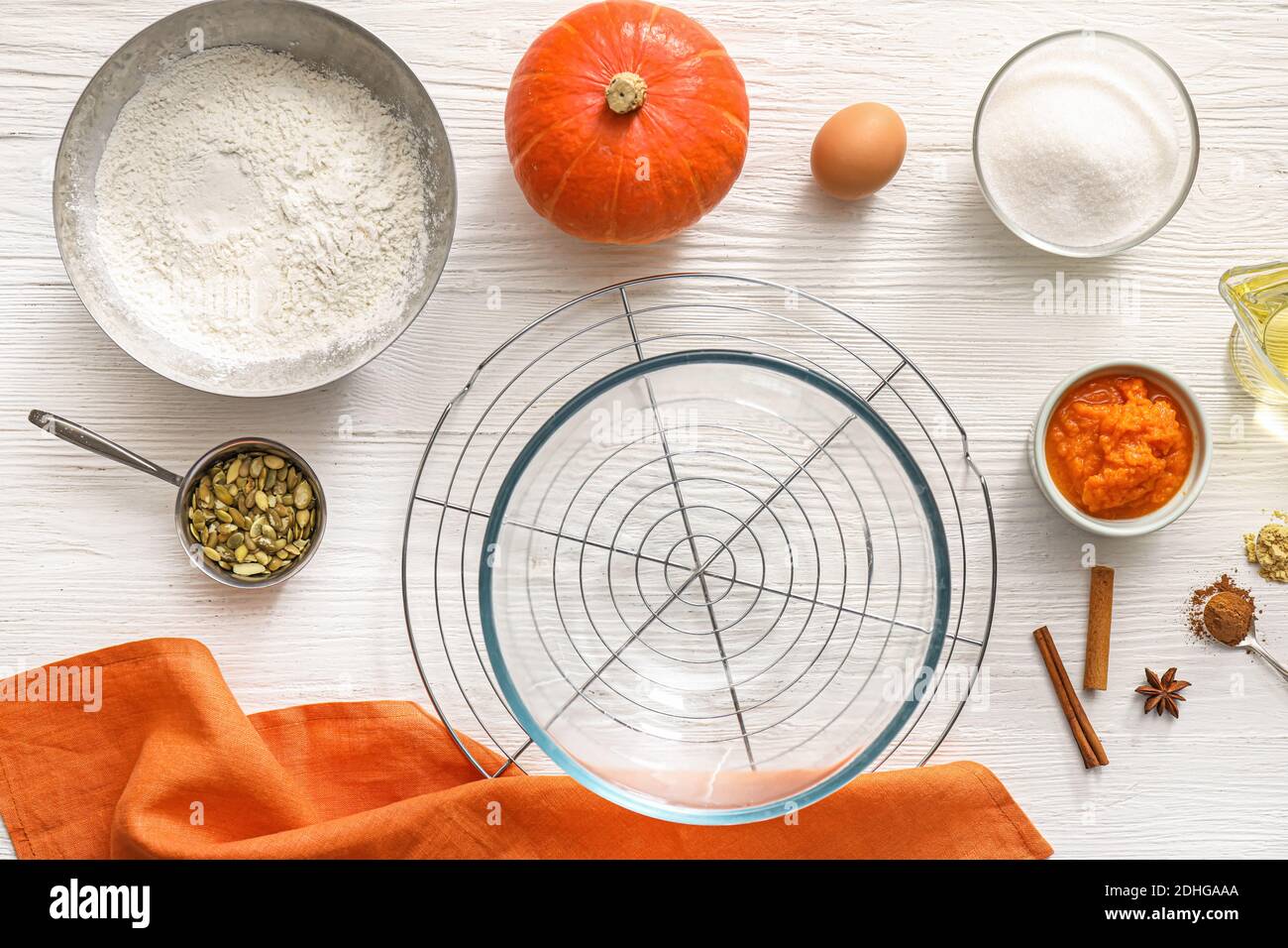Ingredients for preparing pumpkin pie on table Stock Photo