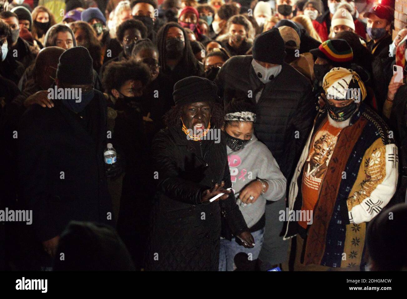 Milwaukee, WI, USA. 10th Dec, 2020. LAURA NICHOLSON (center) speaks to a crowd about her son at his vigil. Family members and friends gather for a vigil at 7 pm on Thursday December 10, 2020 at the spot where 24 year old ANDRE NICHOLSON, JR was shot and killed in the 200 block of east Buffalo Street after leaving a Milwaukee bar around 3:30 am in the downtown Third Ward District, Sunday December 6, 2020. ANDRE NICHOLSON JR was shot multiple times in what family members are describing as a hate crime during a verbal altercation inside the bar with a 23 year old, off-duty Hales Corners firefi Stock Photo