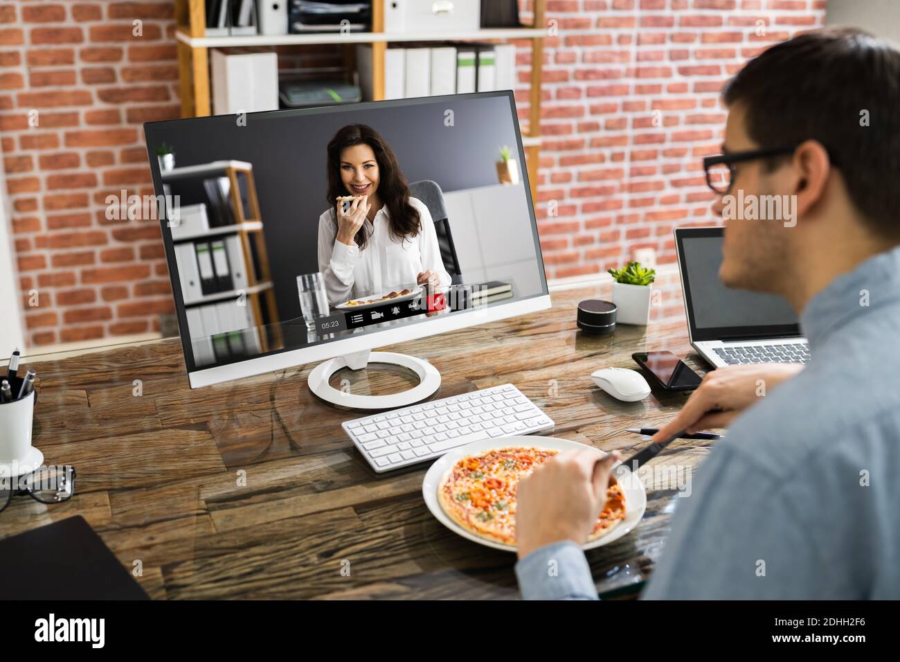 Virtual Office Lunch Break Using Online Video Conference Stock Photo