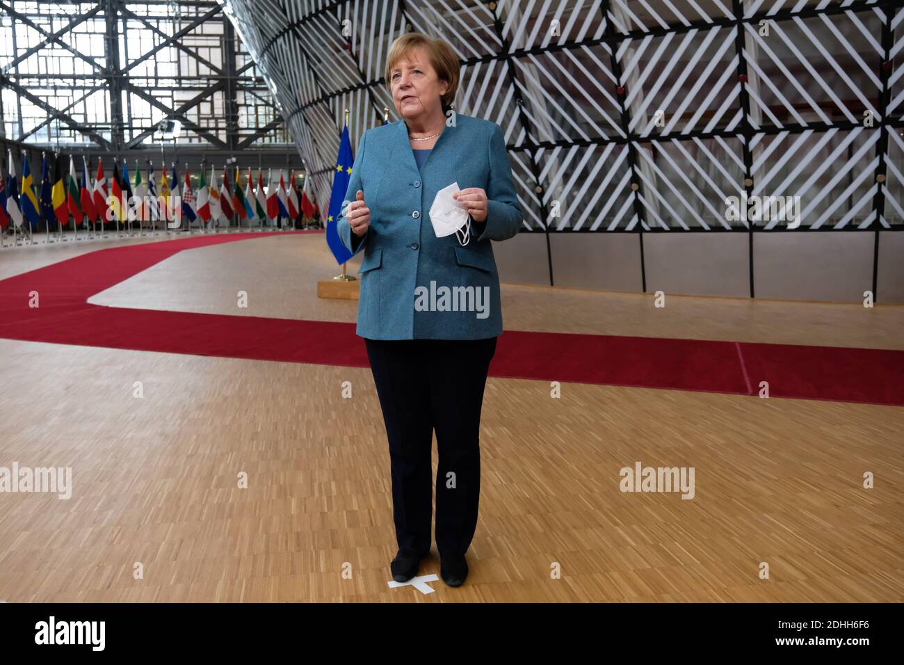 Brussels, Belgium. 10th Dec 2020.  German Chancellor Angela Merkel arrives for the EU summit in Brussels, Belgium, on Dec. 10, 2020. The leaders of the 27 European Union (EU) member states on Thursday reached an agreement on the EU long-term budget and recovery fund, paving way for the implementation of the recovery package totaling over 1.8 trillion euros (2.19 trillion U.S. dollars) to tackle the socio-economic consequences of COVID-19 pandemic. Credit: Xinhua/Alamy Live News Stock Photo
