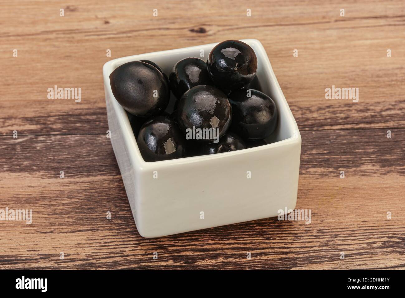 Marinated Black olives in the bowl Stock Photo Alamy