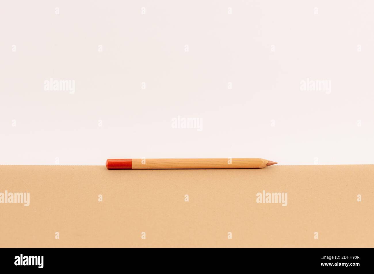 A colored wooden pencil on white background Stock Photo - Alamy