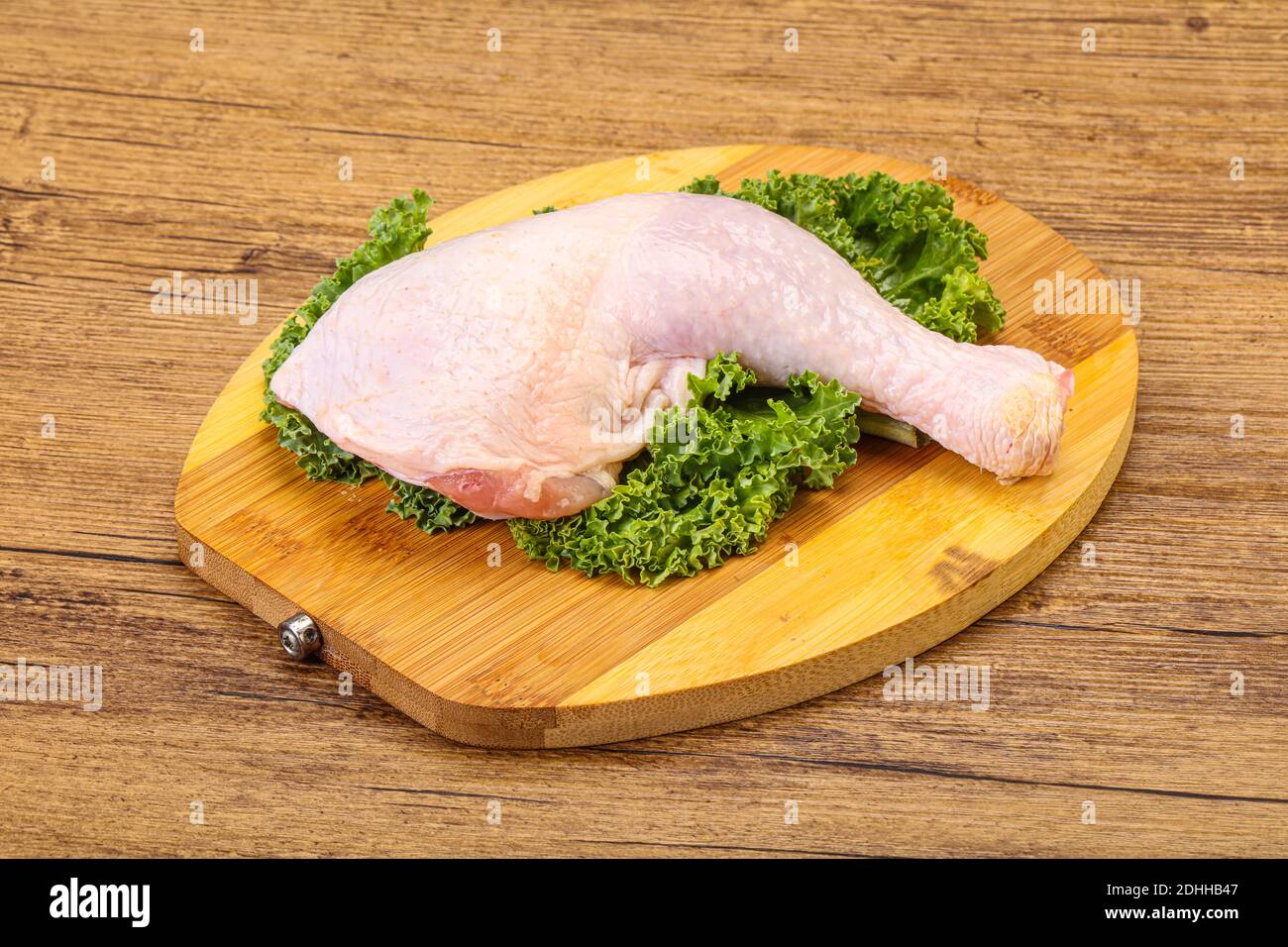 Raw uncooked chicken leg for cooking Stock Photo Alamy