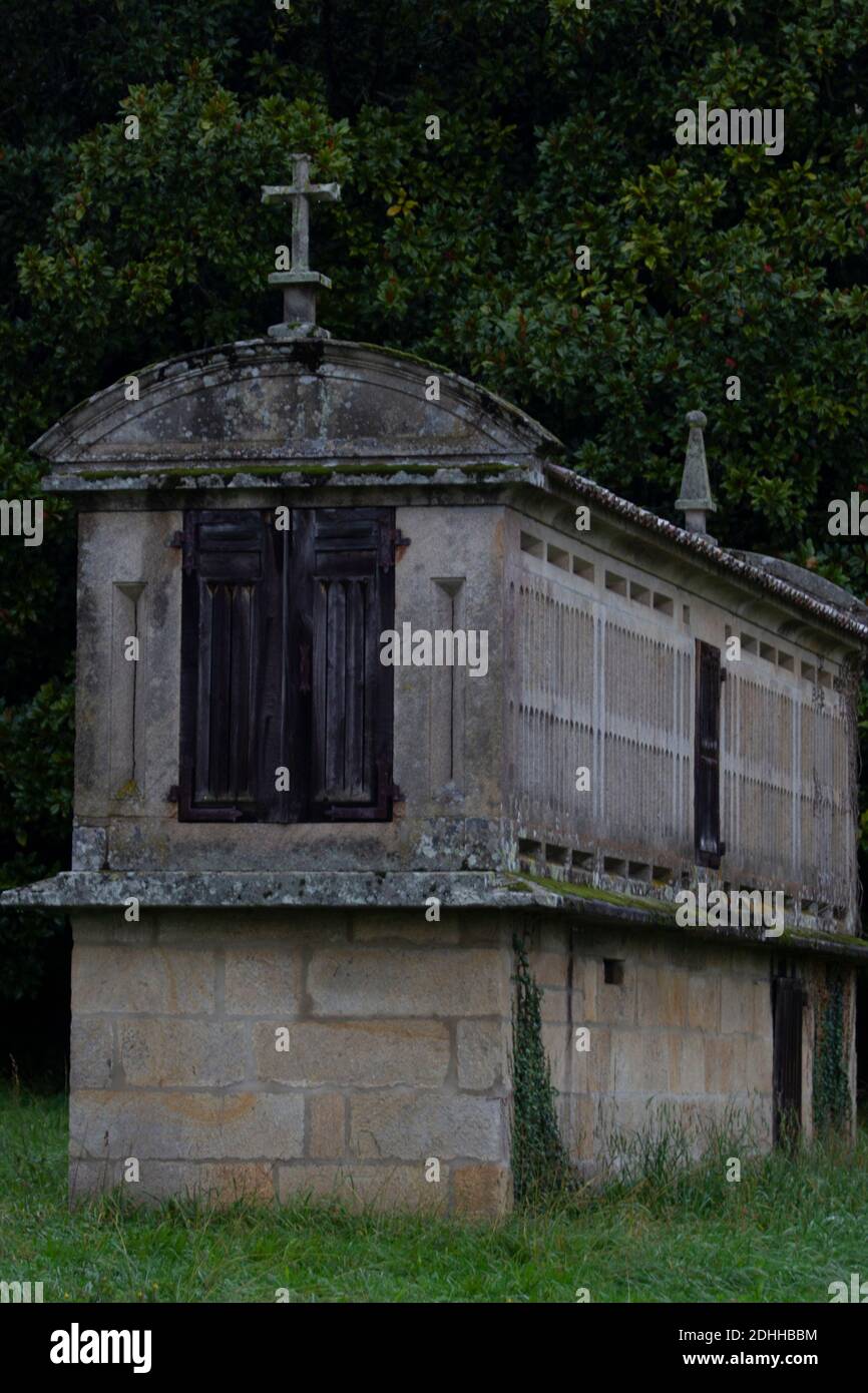 Galician granary construction for agricultural use destined to dry, cure and store corn and other very typical cereals in Galicia Spain Stock Photo
