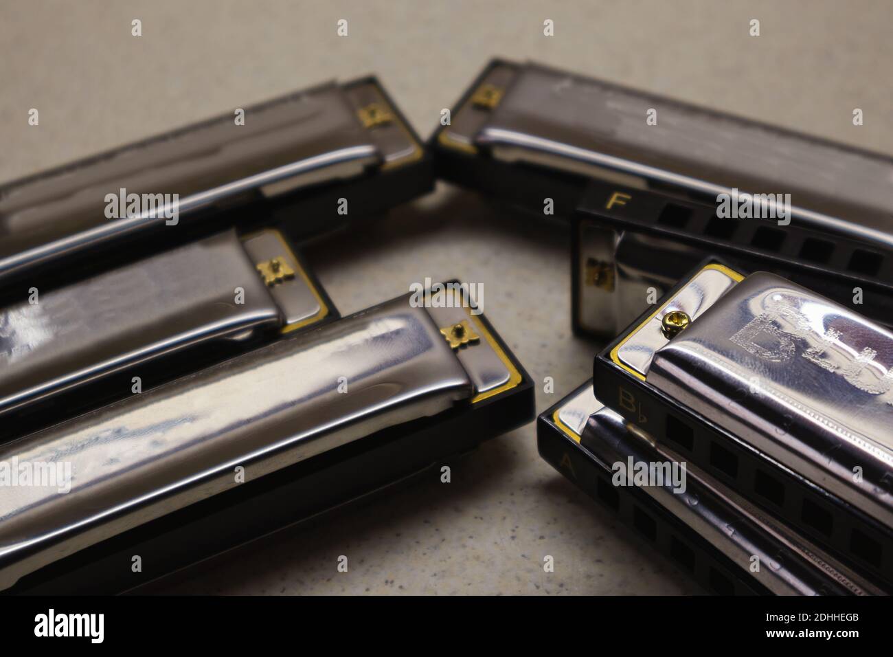New set of small harmonicas, in all tonalities. Stock Photo