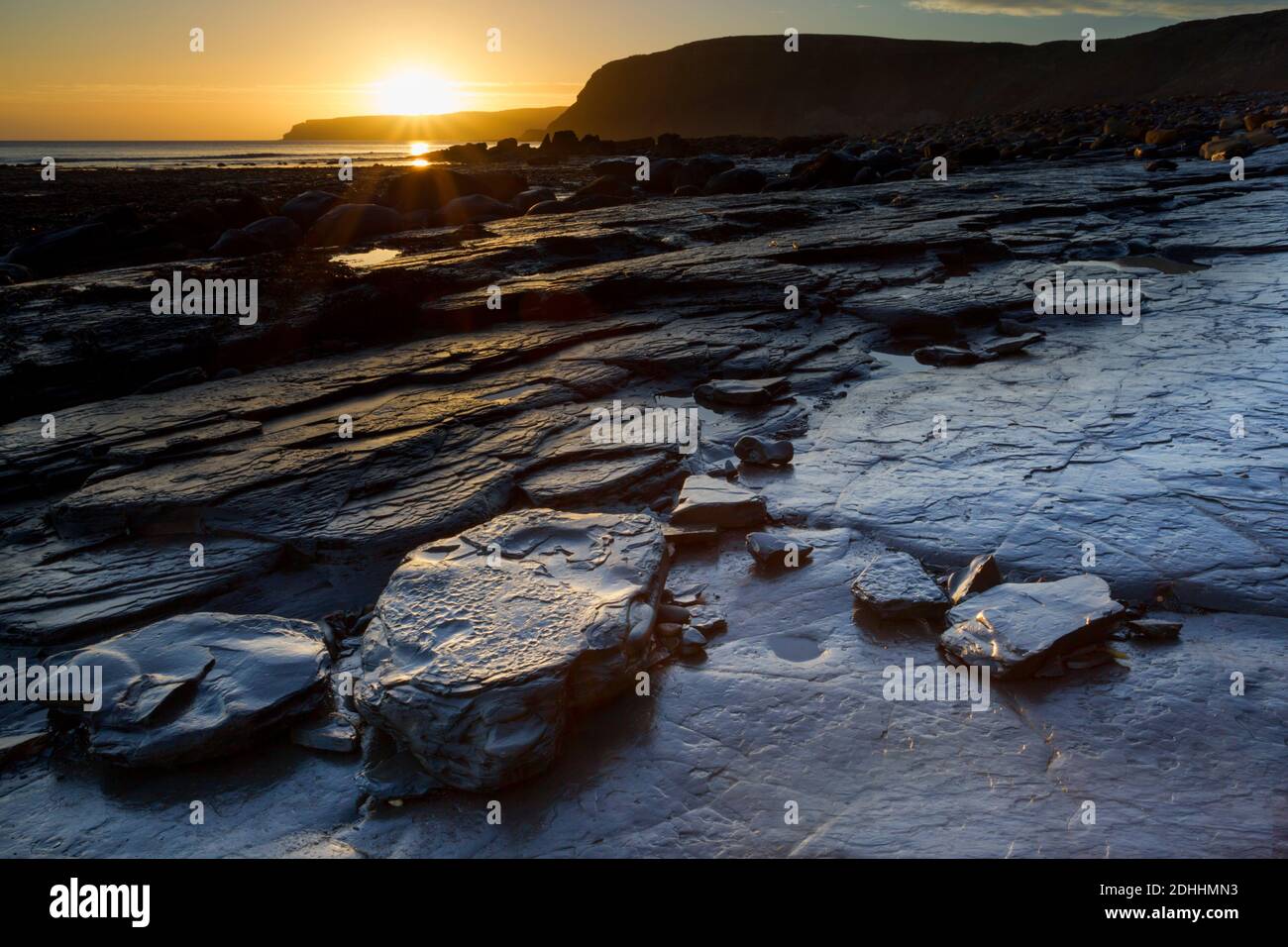 Port Mulgrave at sunrise looking southeast towards Kettleness on the north east coast of England within the North York Moors national park Stock Photo