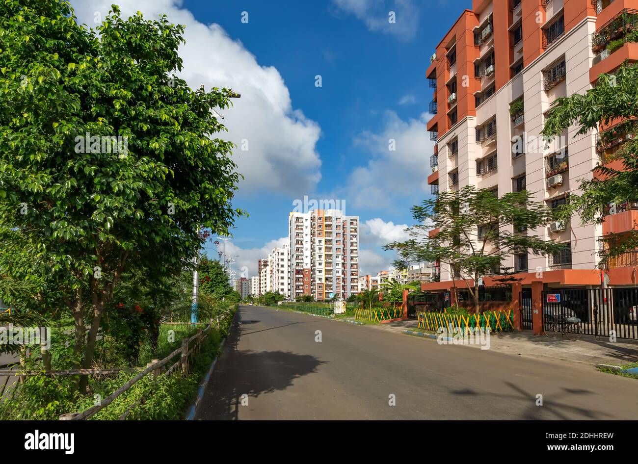 City road with residential building apartments at New Town, Rajarhat