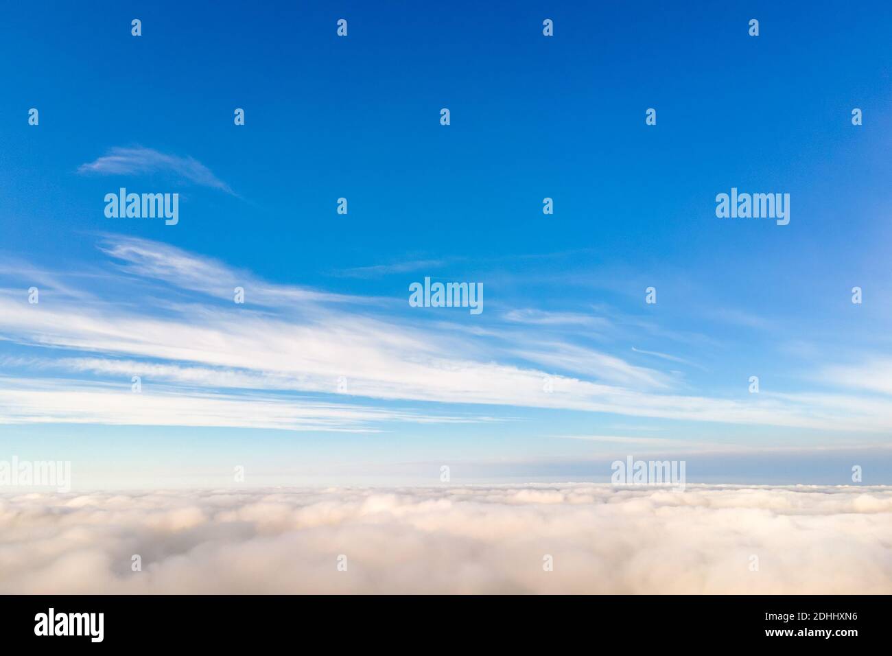 Aerial view from above of white puffy clouds in bright sunny day Stock ...