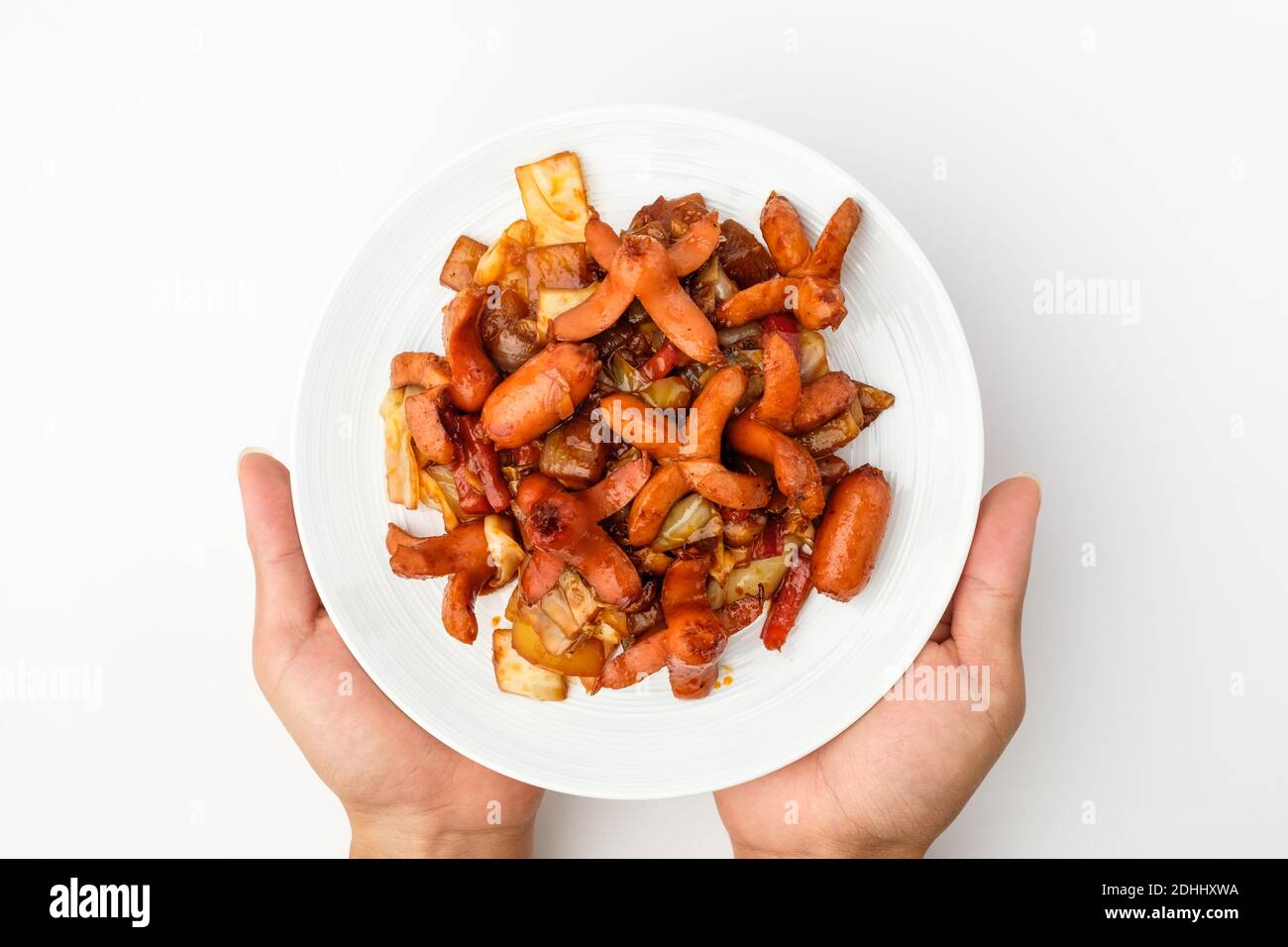Stir sausage on white background Stock Photo