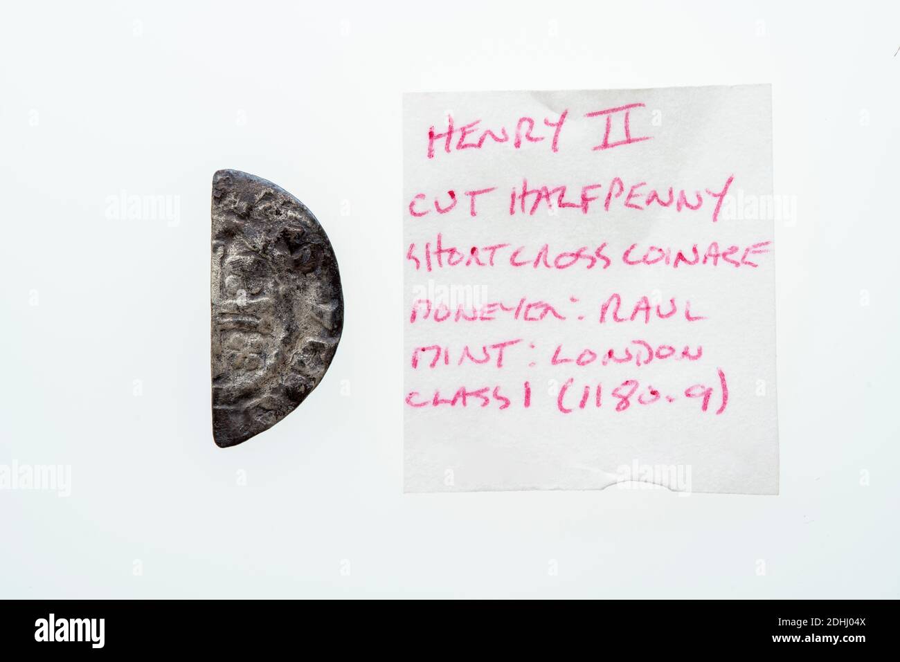 Silver short cross cut half penny English hammered coin of King Henry II of the 12th century dated around 1180- 1189  minted in London England isolate Stock Photo