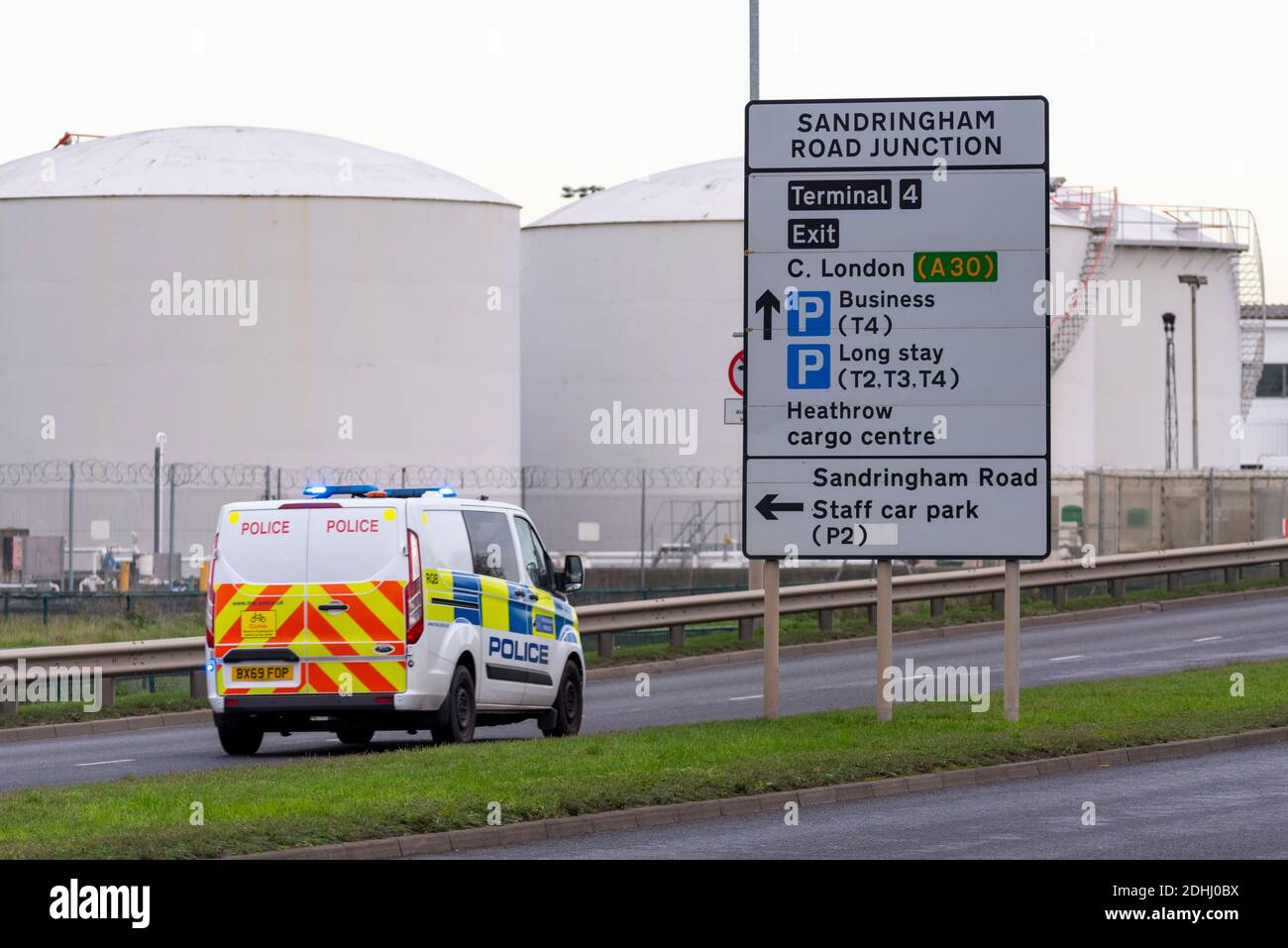 Police responding to an incident at the Sandringham Road Fuel Farm entrance at London Heathrow Airport, UK, close to the fuel tanks. Security Stock Photo
