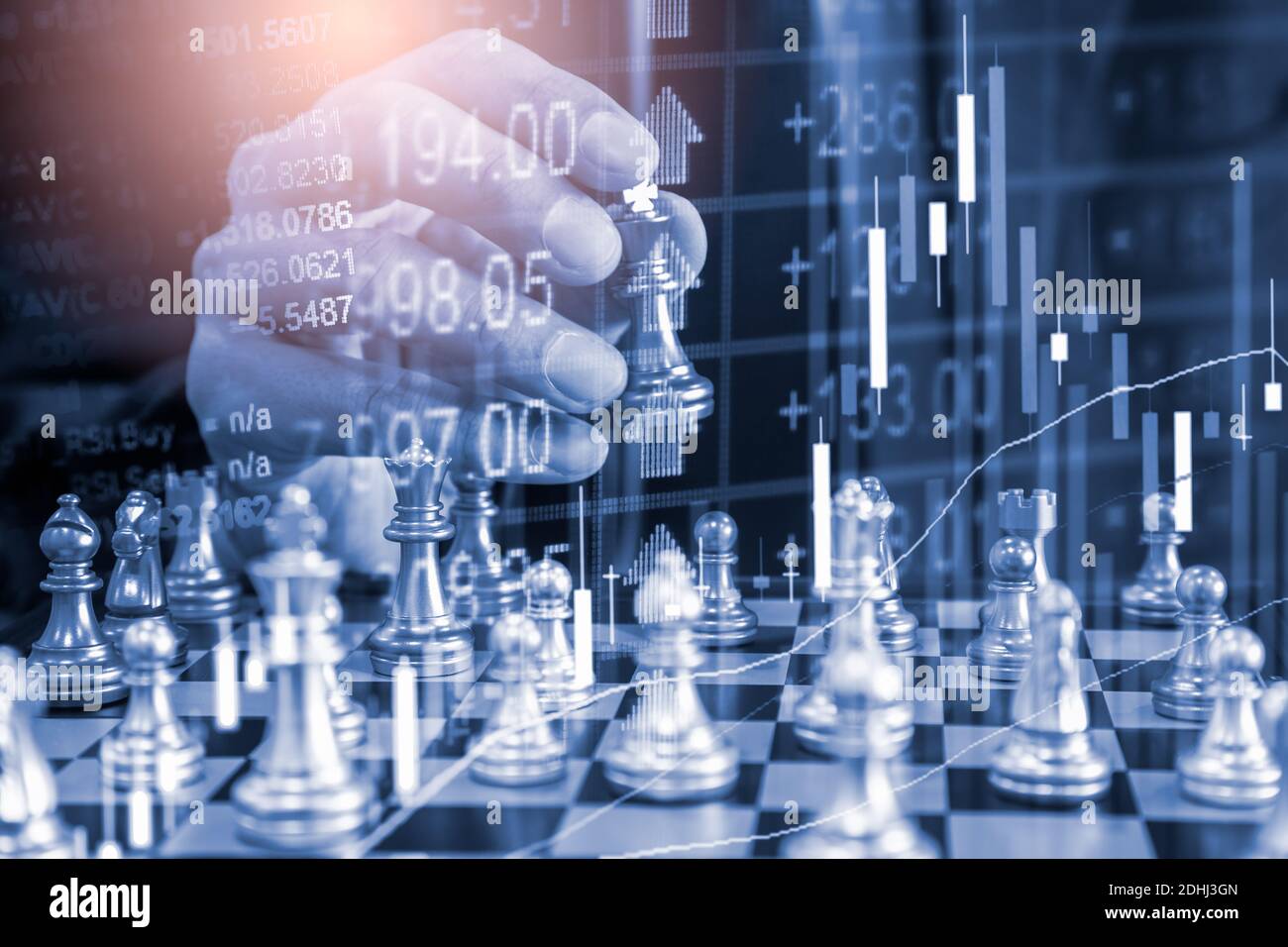 Chess game on chess board behind business man background. Business concept  to present financial information and marketing strategy analysis. Investmen  Stock Photo - Alamy