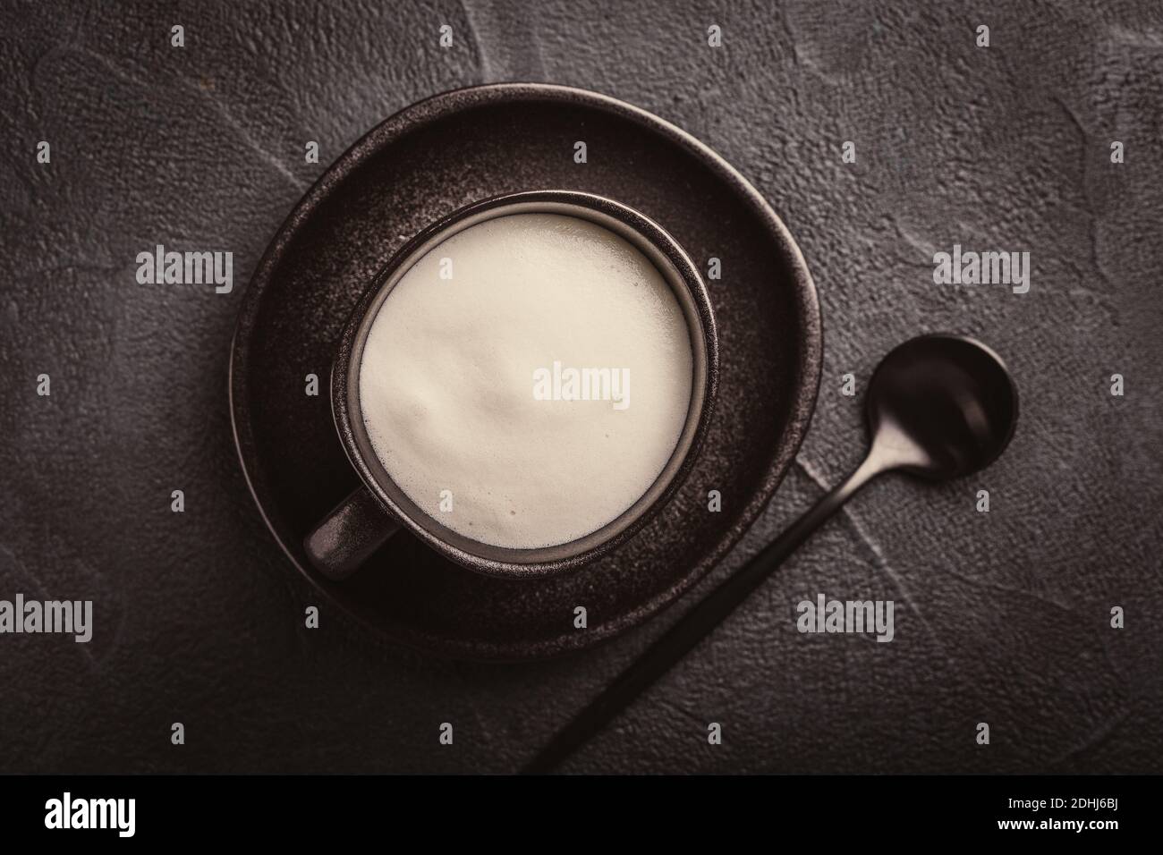 Cappuccino on black background. Stock Photo