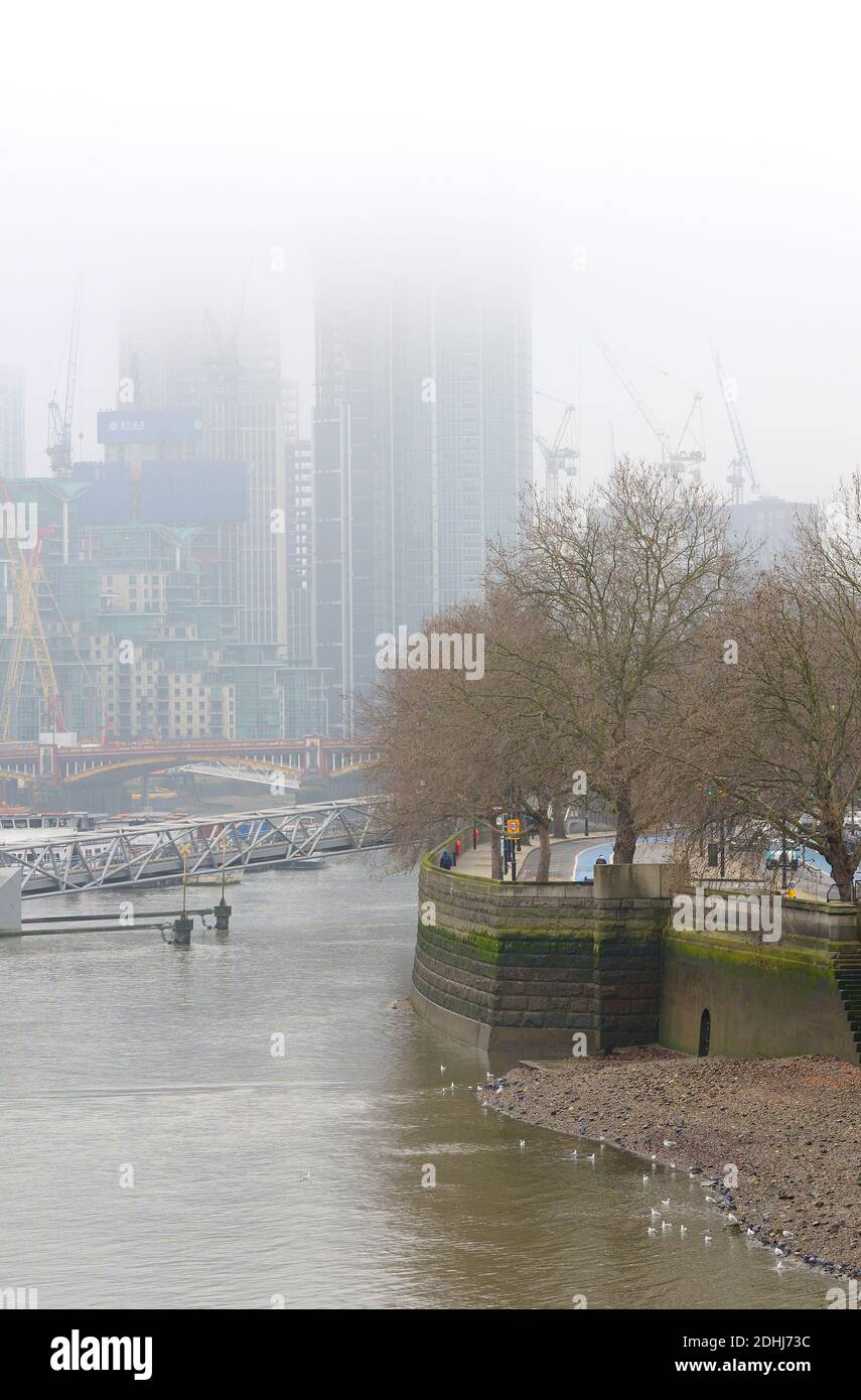 London, England, UK. Foggy day on the River Thames - low cloud. Dec 2020 Stock Photo