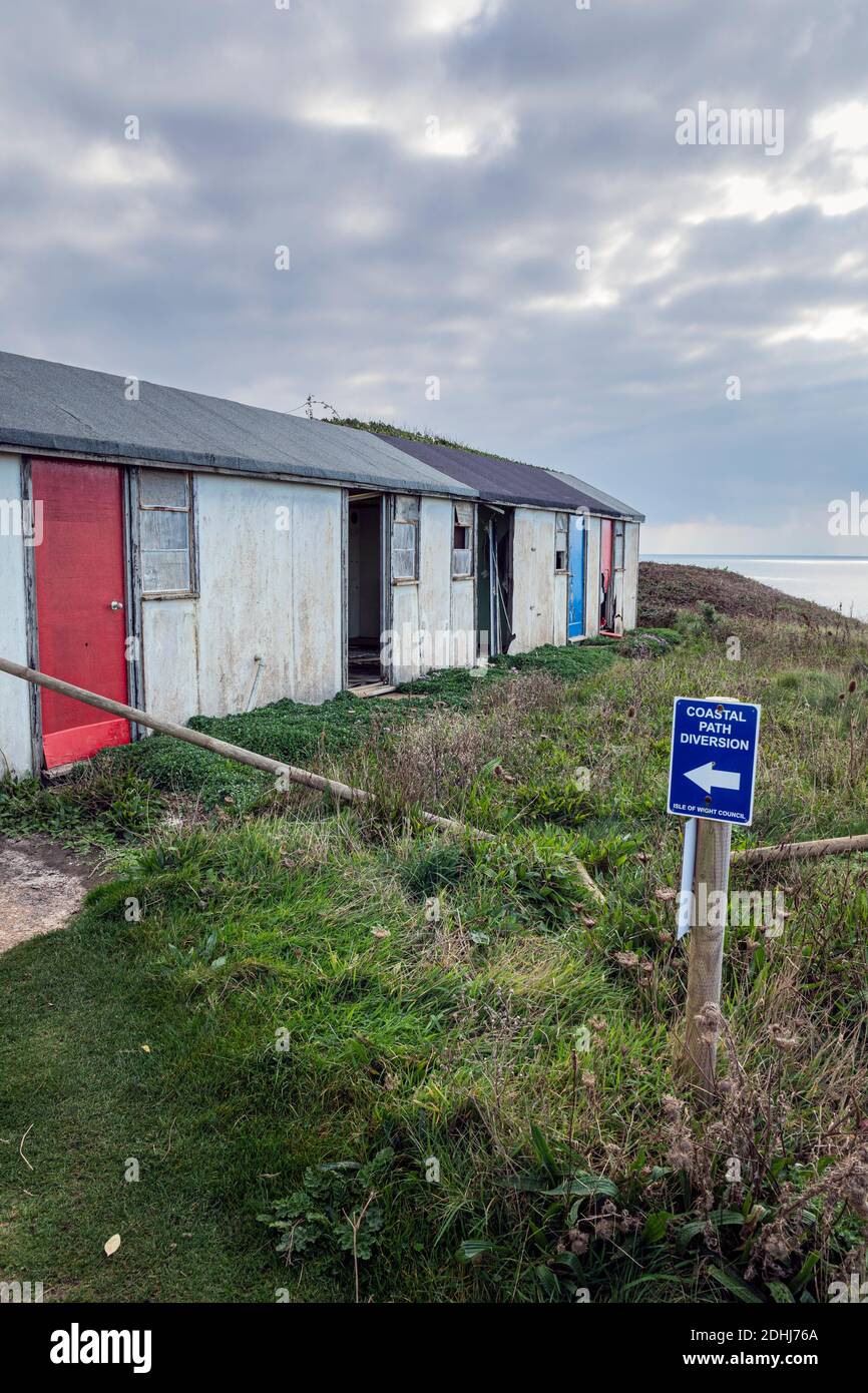 The diverted coast path and holiday chalets abandoned because of cliff