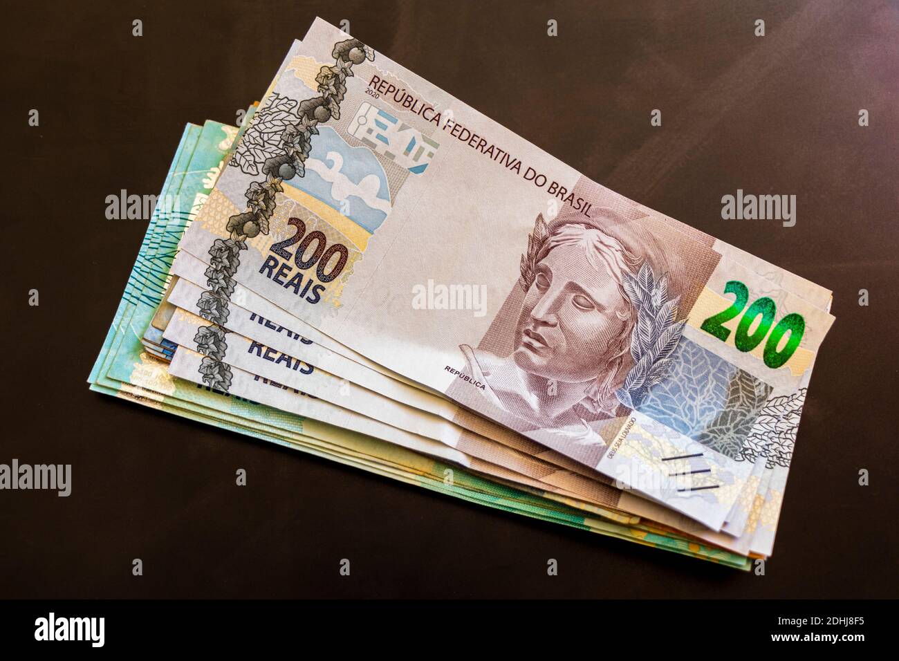 Be rich with money in Brazil. 200 Brazilian banknotes Reaís Real R BRL
