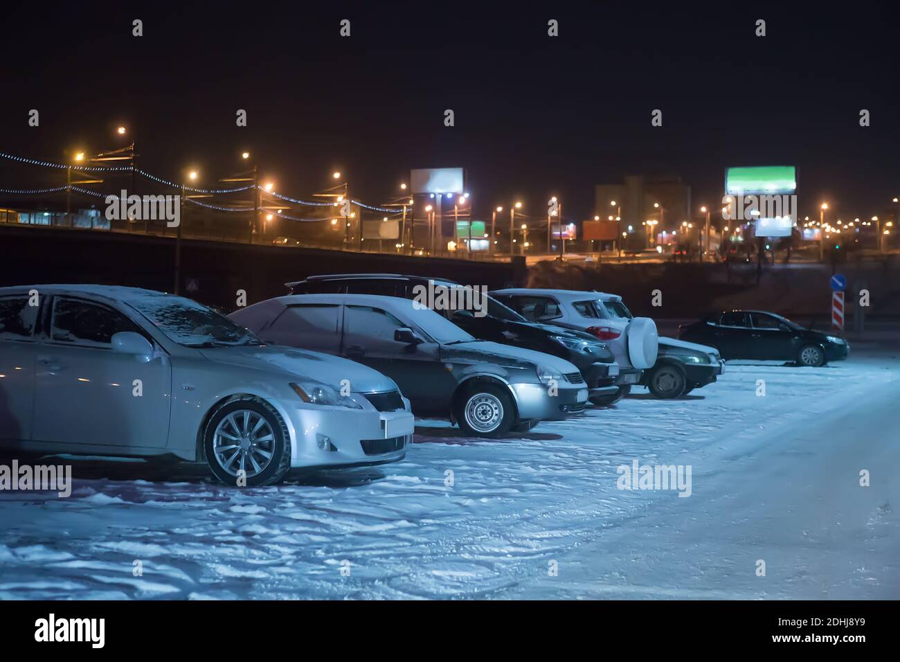 cars in the parking lot in the winter in the city Stock Photo - Alamy