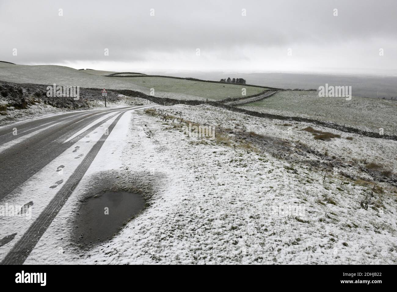 Pictured is a snowy scene in the Yorkshire Dales above Leyburn. weather snow winter snowing Stock Photo