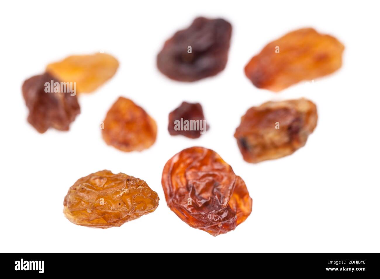 Some raisins on white background Stock Photo