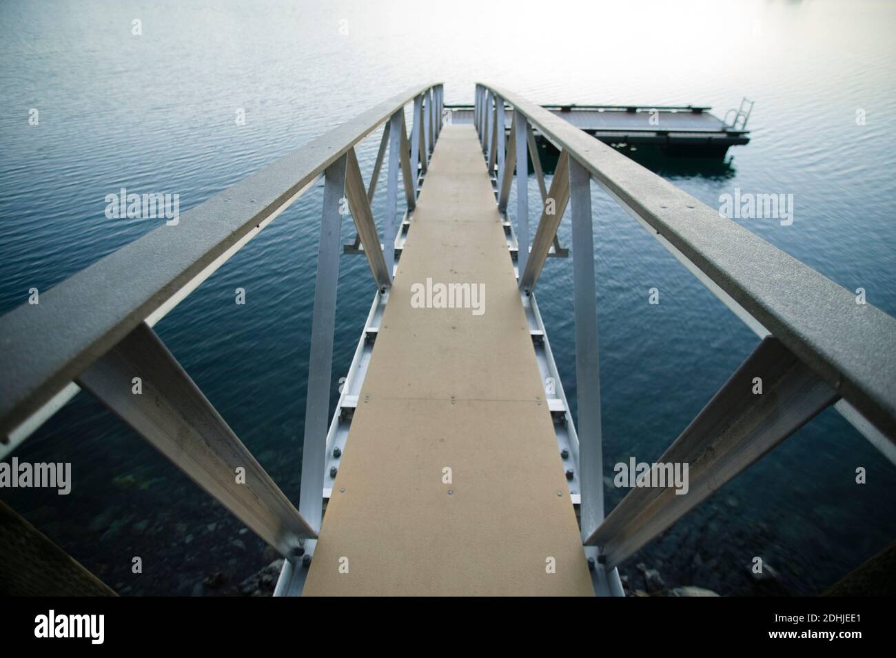 Walkway to jetty in water Stock Photo Alamy