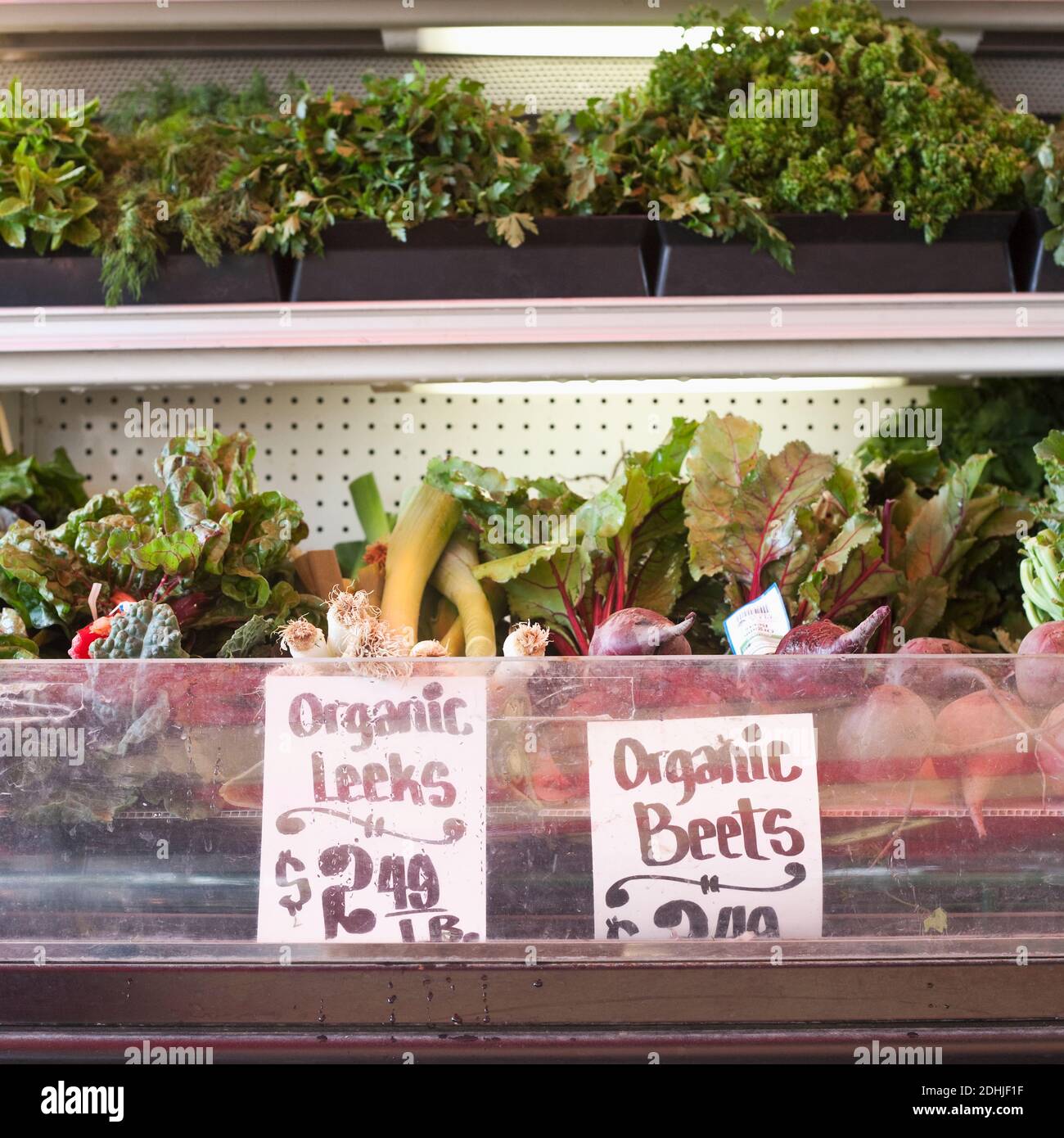 Signs in an organic produce display fridge Stock Photo Alamy