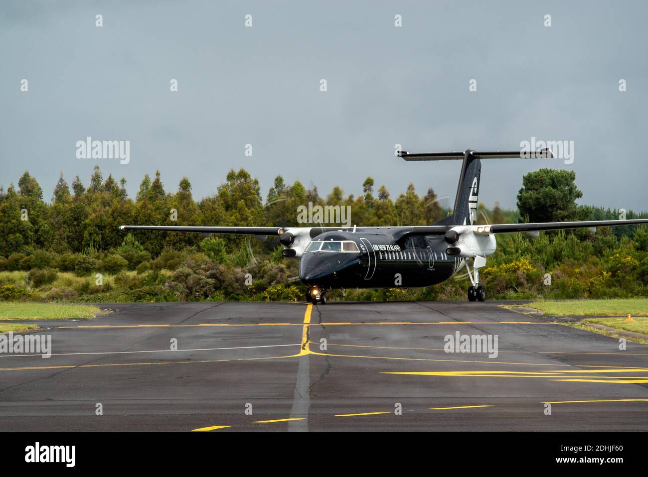 An Air New Zealand Bombardier Dash 8 Q300 aircraft in all black livery at Taupo Airport Stock Photo