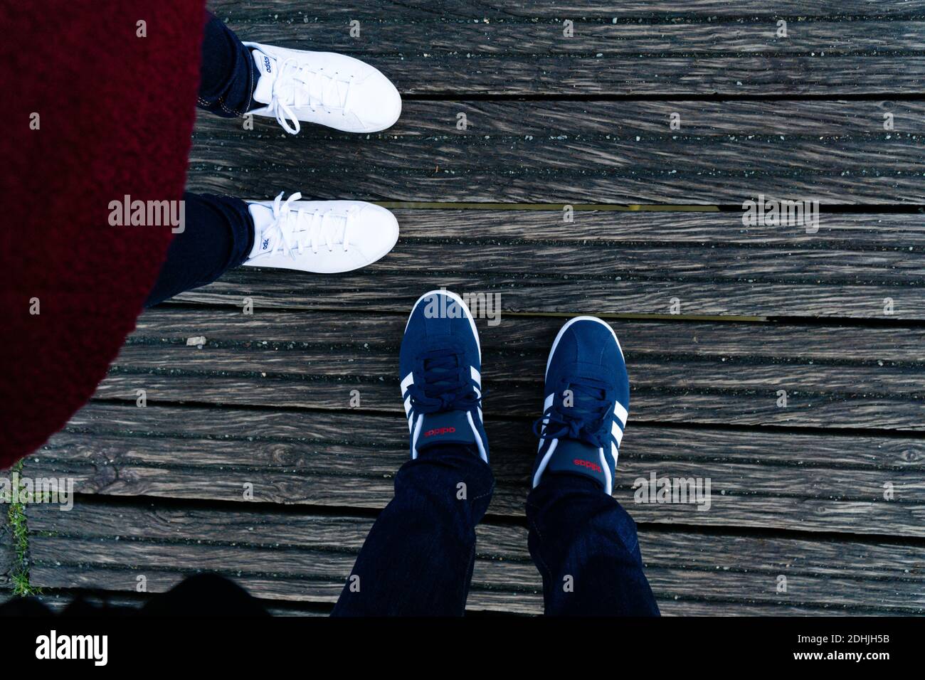 PARIS, FRANCE - Jul 06, 2017: Super nice High Angle shot of male and female  foots wearing Adidas sneakers, France, Paris Stock Photo - Alamy