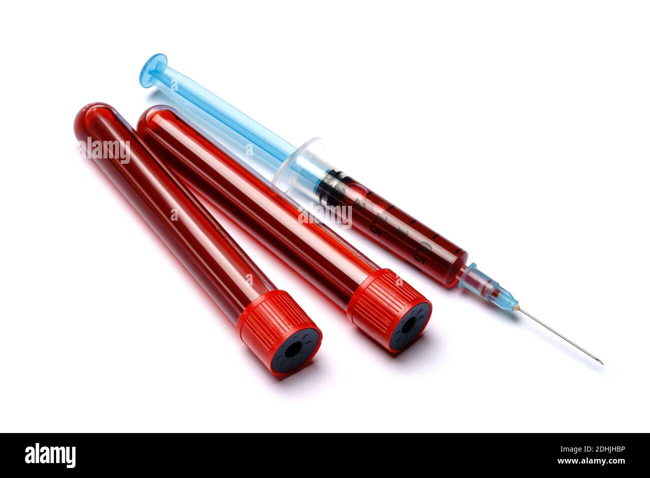 Medical syringe and plastic test tube isolated on white background ...
