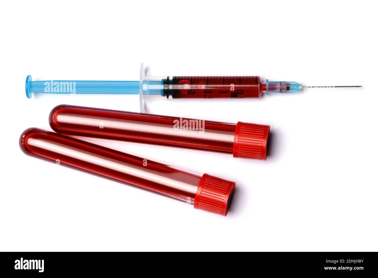 Medical syringe and plastic test tube isolated on white background ...