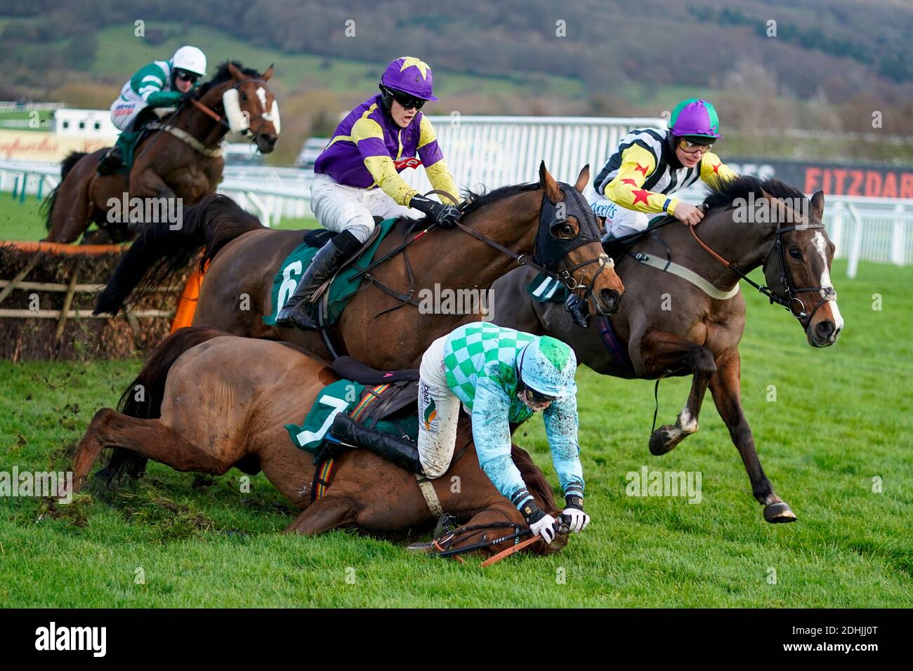 Gina Andrews riding Haafapiece fall at the last fence in The Catesby Handicap Hurdle during day one of The International Meeting at Cheltenham Racecourse. Stock Photo