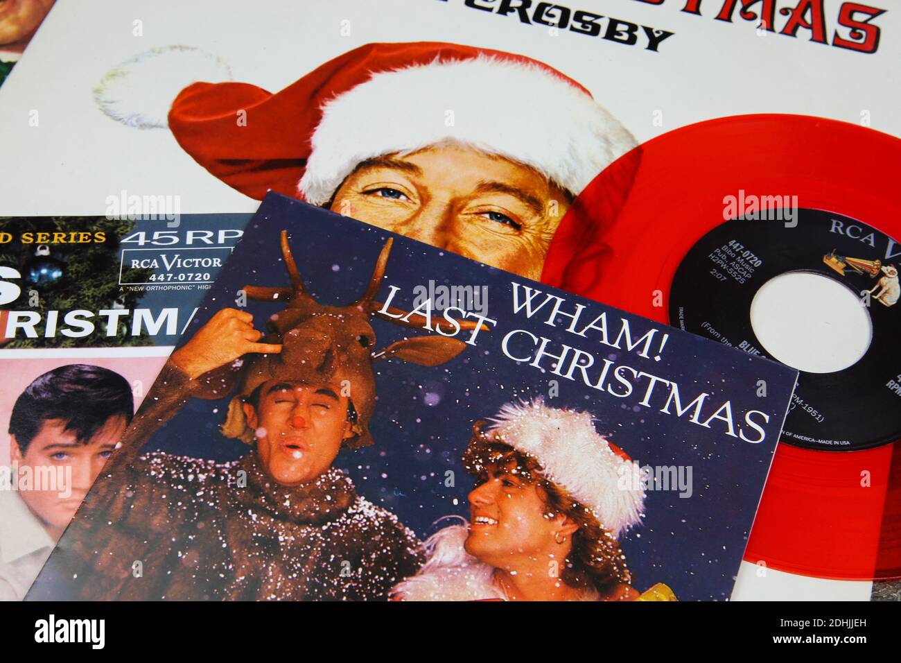 Viersen, Germany - December 9. 2020: Close up of vintage vinyl record cover singles with famous christmas songs (focus on Wham last christmas cover) Stock Photo