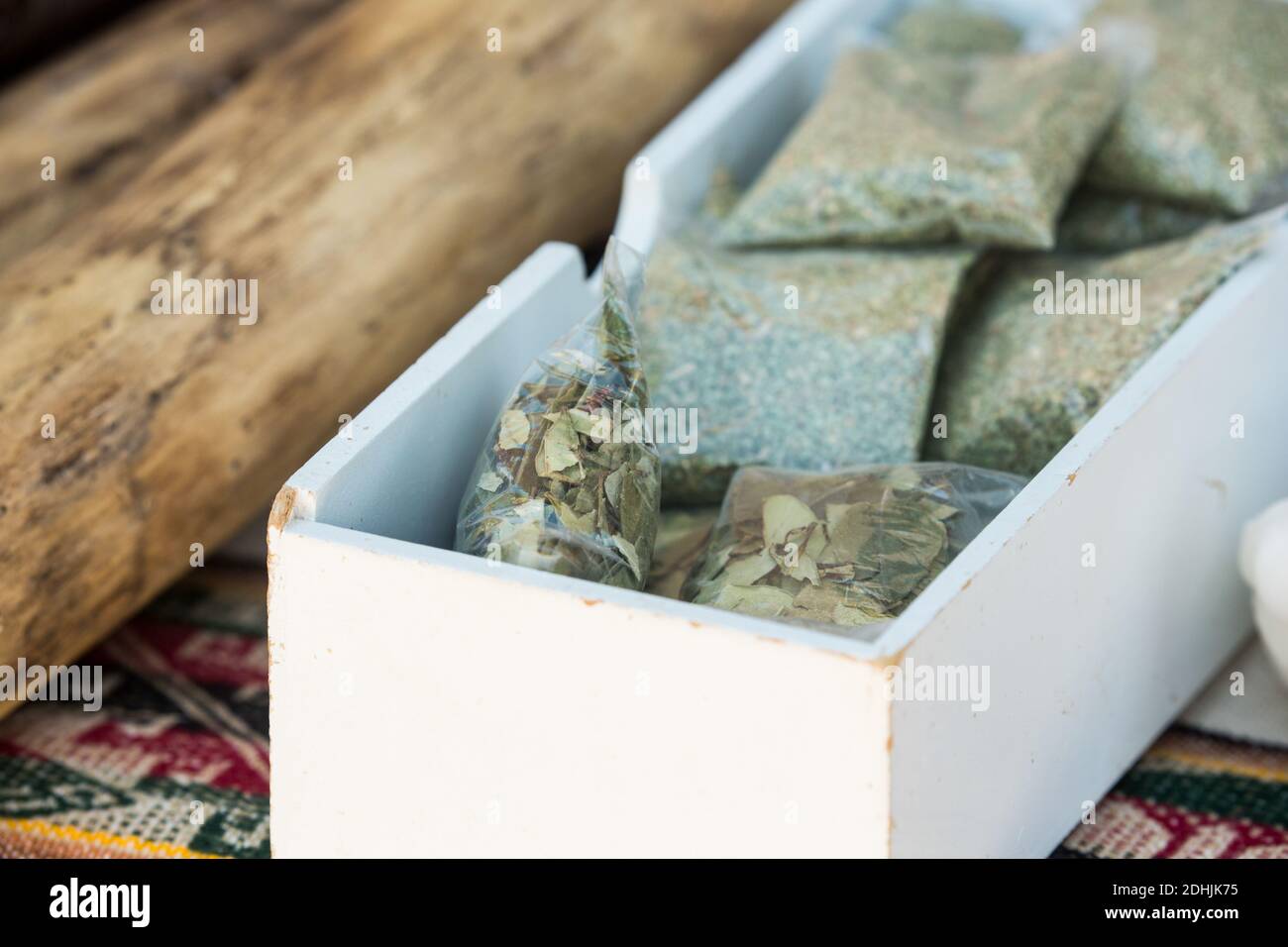 Dried coca leaves in bags for sale at the high altitude village of