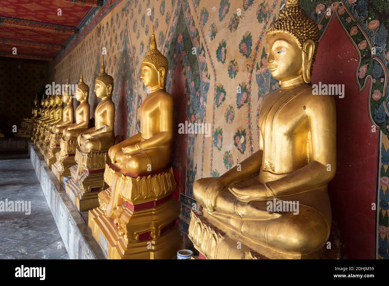 Statues of Buddha WAT ARUN: Temple of the Dawn in Bangkok, Thailand Stock Photo