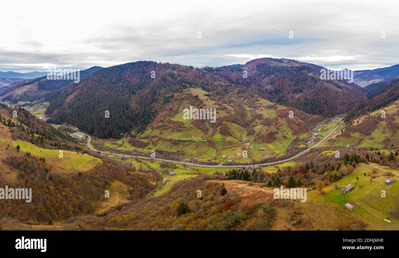 Small village in a mountain valley of the Carpathian Mountains on an ...