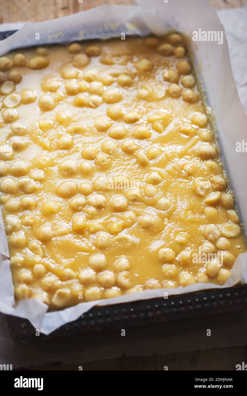 Making chewy caramels with salted macadamia nuts christmas gift idea